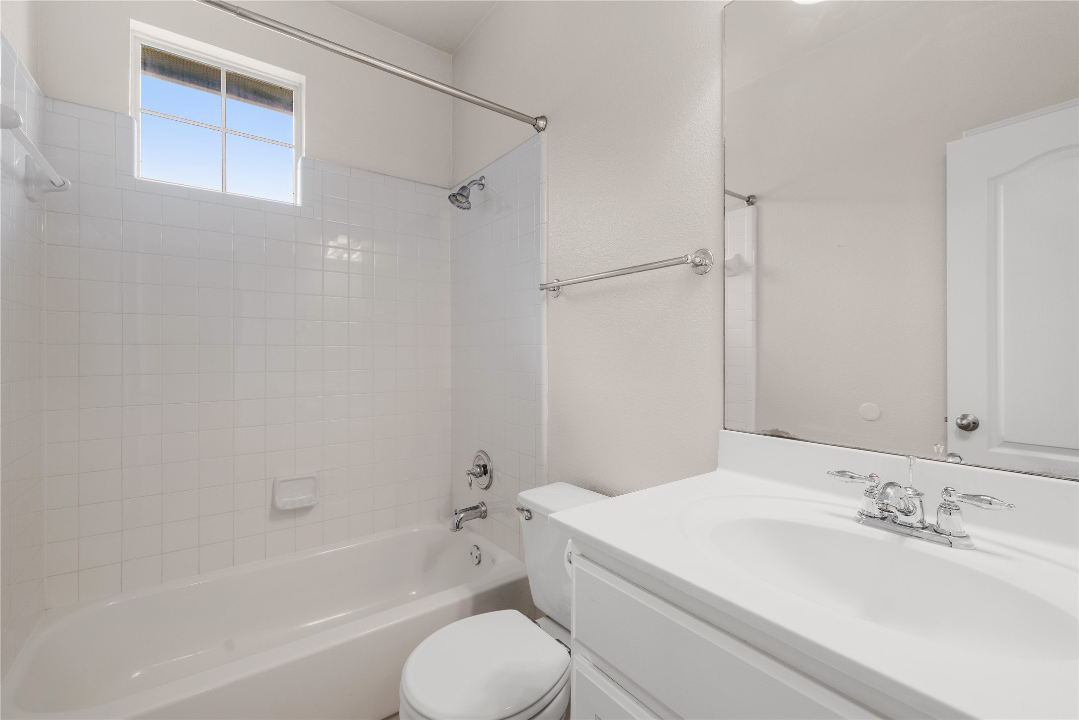 11000 Anderson Mill Road, Unit 45 Austin, TX 78750 - Photo 16 of 32 a bathroom with a sink toilet and shower