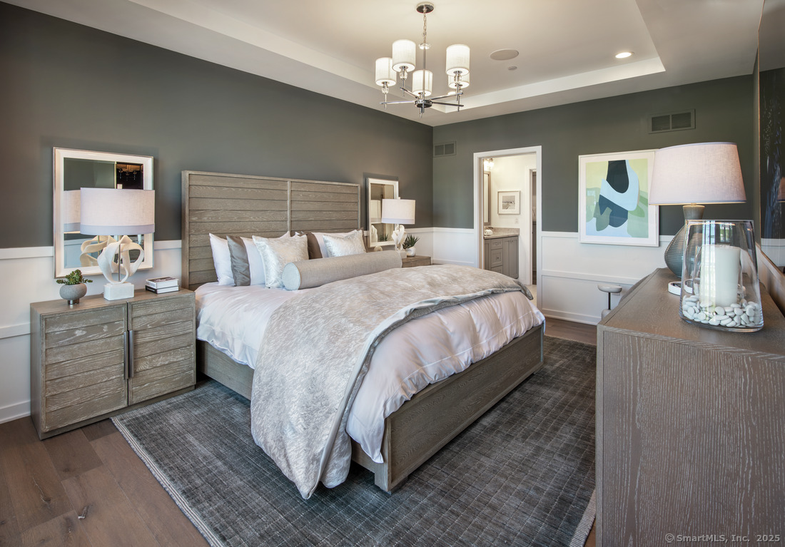 4 Whisper Rdg Way, Unit 41 Woodbridge, CT 06525 - Photo 3 of 12 a large bedroom with bed and window