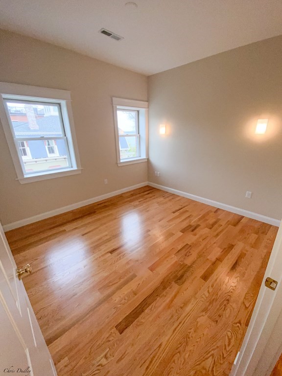 53 Thomas Park, Unit 9 Boston, MA 02127 - Photo 21 of 41 a view of an empty room and window