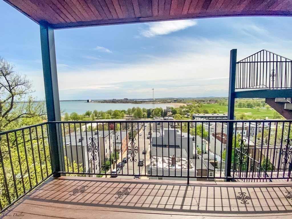 53 Thomas Park, Unit 9 Boston, MA 02127 - Photo 26 of 41 a view of balcony with wooden floor