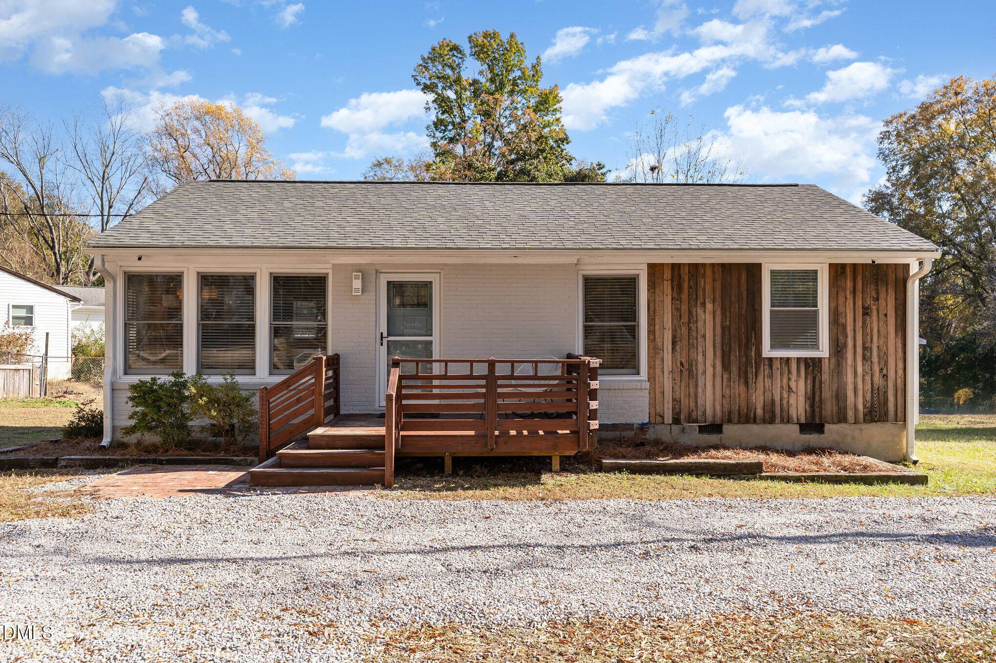 1002 Southerlund Road Garner, NC 27529 - Photo 1 of 12 a view of a house with a yard