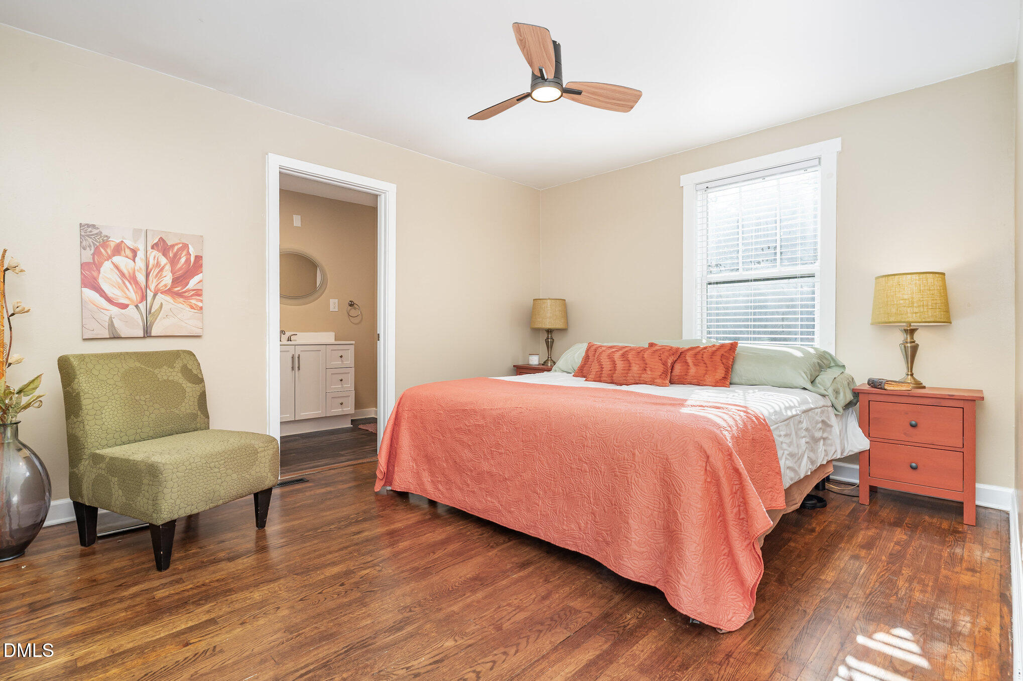 1002 Southerlund Road Garner, NC 27529 - Photo 6 of 12 a bedroom with a bed and a couch