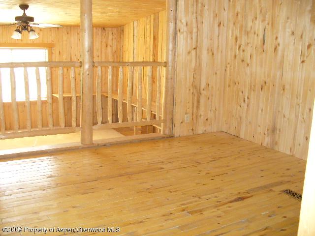 480 Jewell Lane, Unit C R 259 Rifle, CO 81650 - Photo 8 of 12 a view of empty room with floor to ceiling window