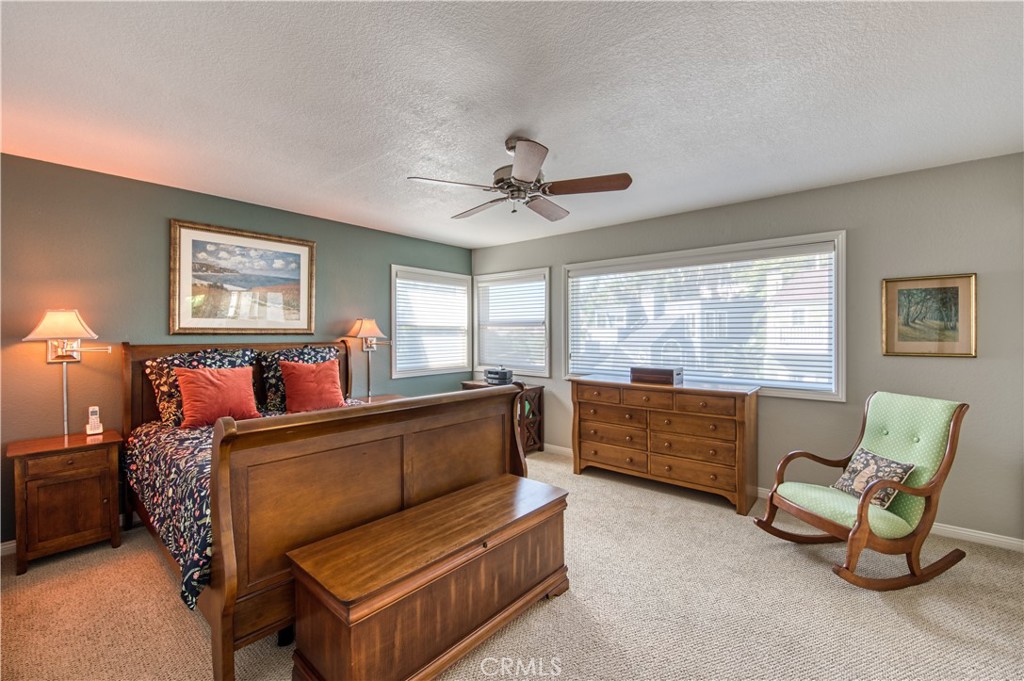 34052 Crystal Lantern Dana Point, CA 92629 - Photo 19 of 42 a bed room with furniture and a window