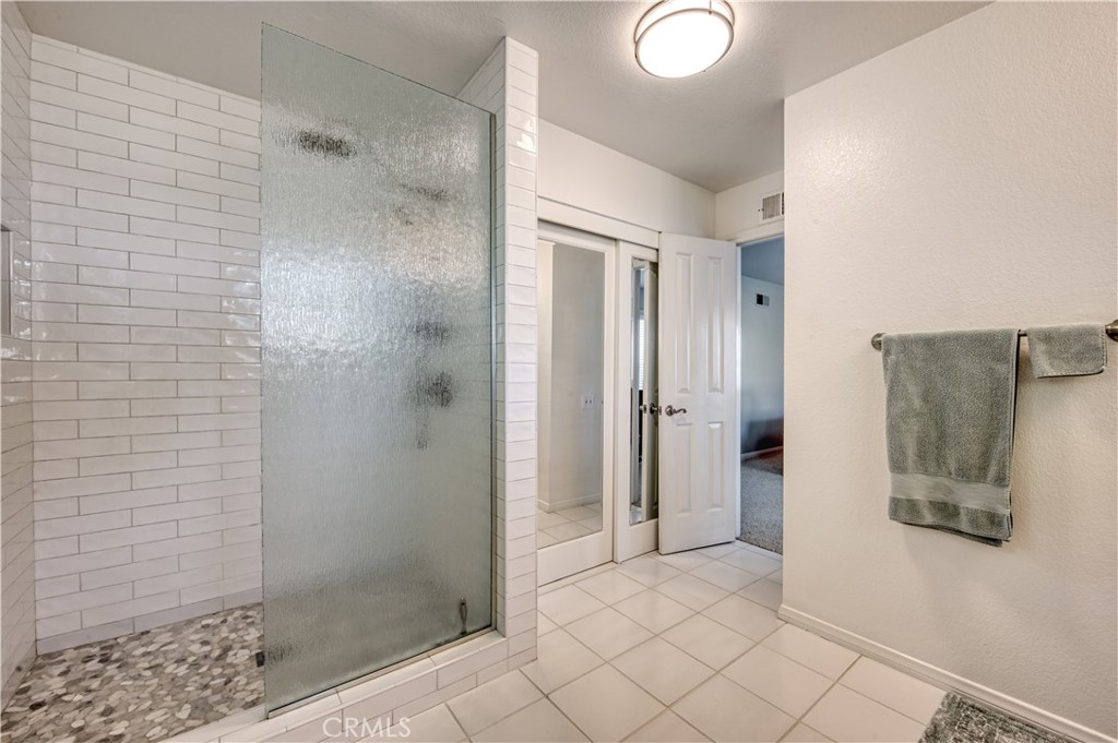 34052 Crystal Lantern Dana Point, CA 92629 - Photo 23 of 42 a bathroom with a shower