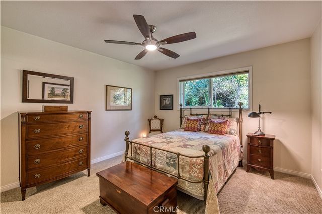 a bedroom with a bed and a table