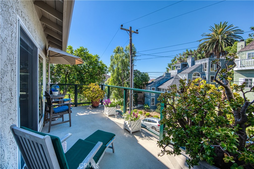 34052 Crystal Lantern Dana Point, CA 92629 - Photo 9 of 42 a view of a balcony with chairs and potted plants
