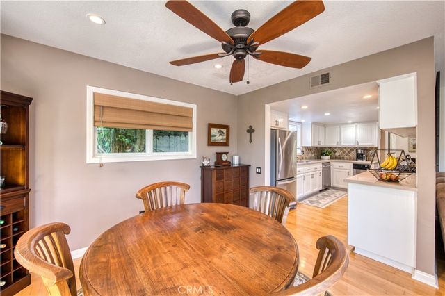 a bedroom with furniture and a chandelier