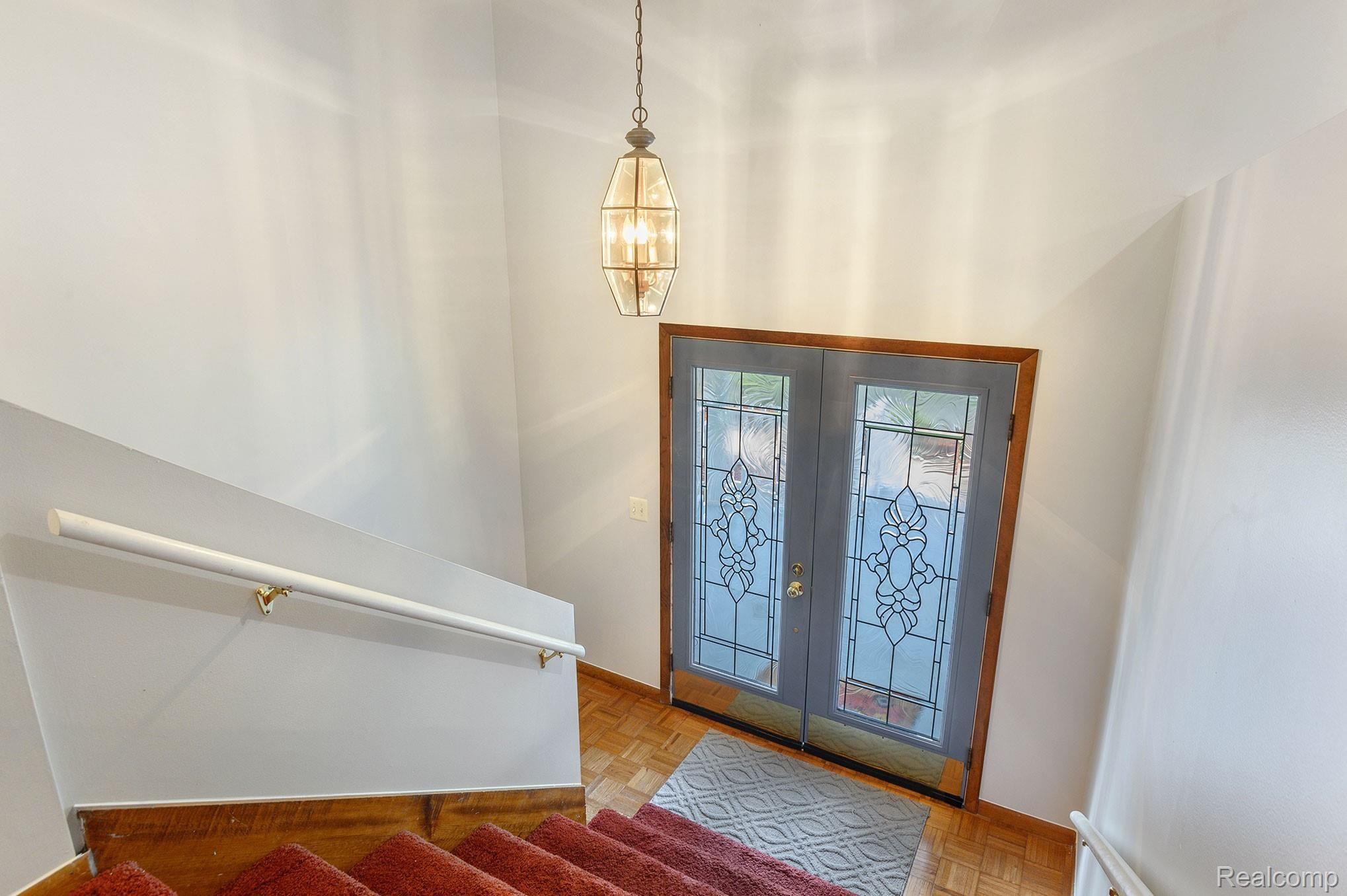 2469 Academy Road Holly, MI 48442 - Photo 33 of 44 Front Door, stairs to Basement
