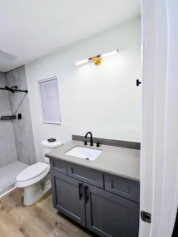 a bathroom with a sink and a toilet