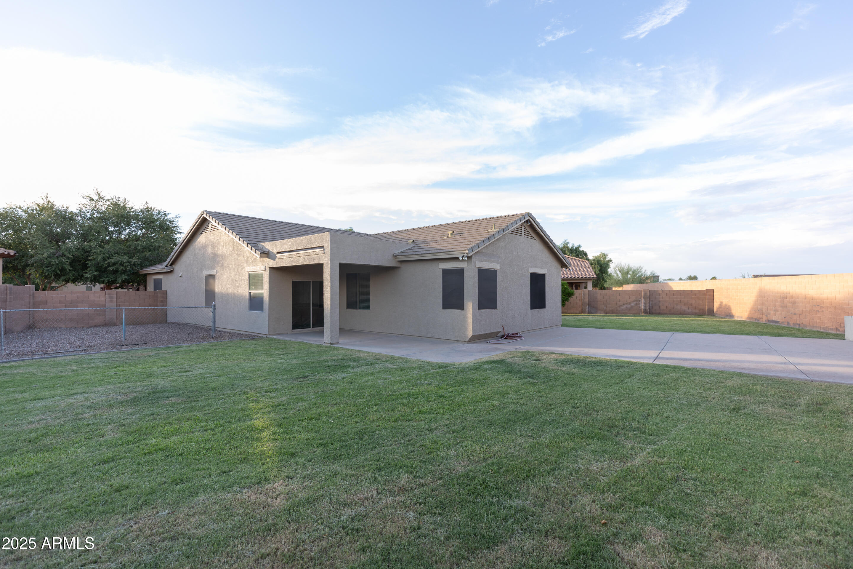 4759 South Granite Street Gilbert, AZ 85297 - Photo 26 of 29 a view of a yard in front of a house with a large tree