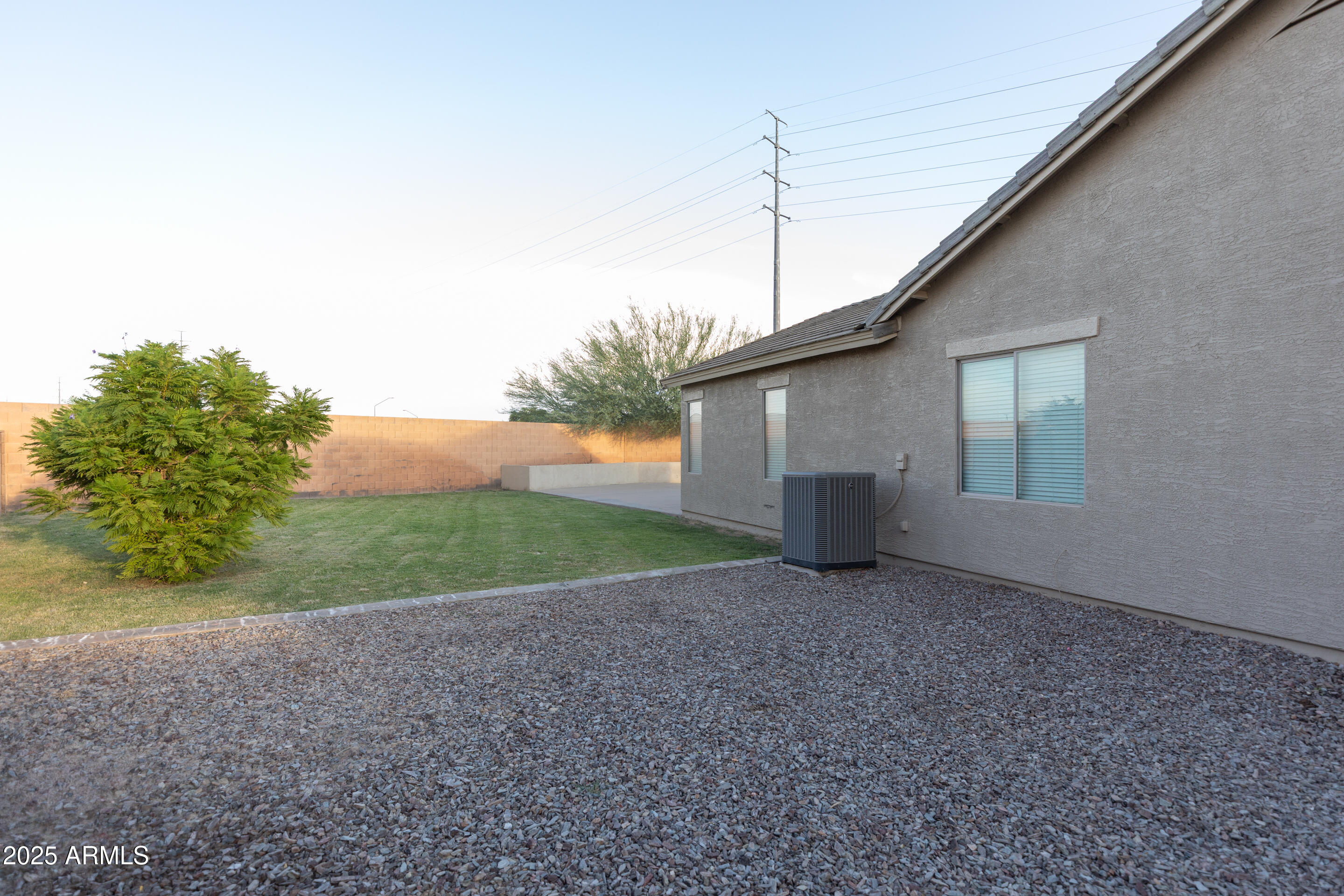 4759 South Granite Street Gilbert, AZ 85297 - Photo 29 of 29 a view of a house with backyard and bushes