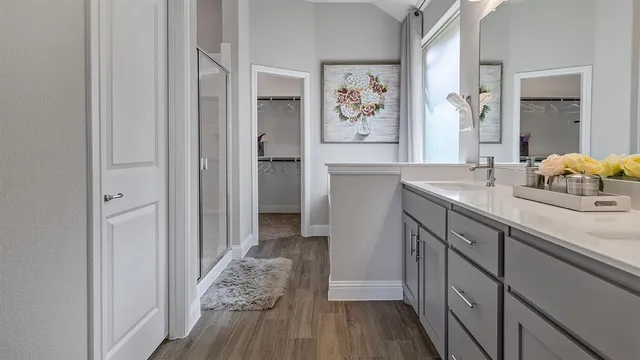 a bedroom with a bed and a couch