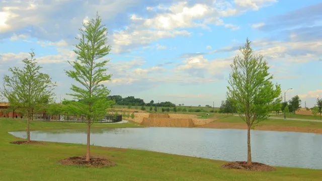 a view of storage and utility room with wooden floor