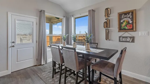 a view of entryway with wooden floor