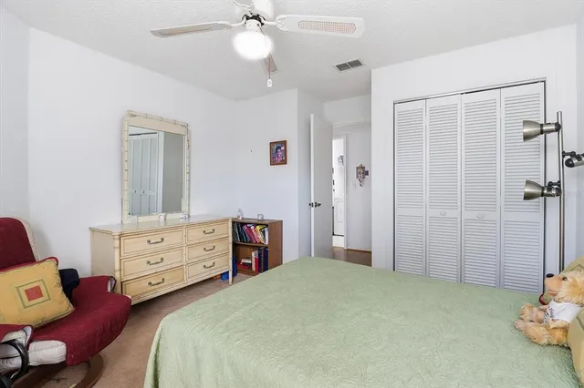 a view of a pathway both side of house