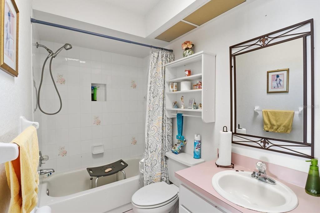 1046 Castille Drive Spring Hill, FL 34608 - Photo 27 of 44 a bathroom with a sink toilet and shower