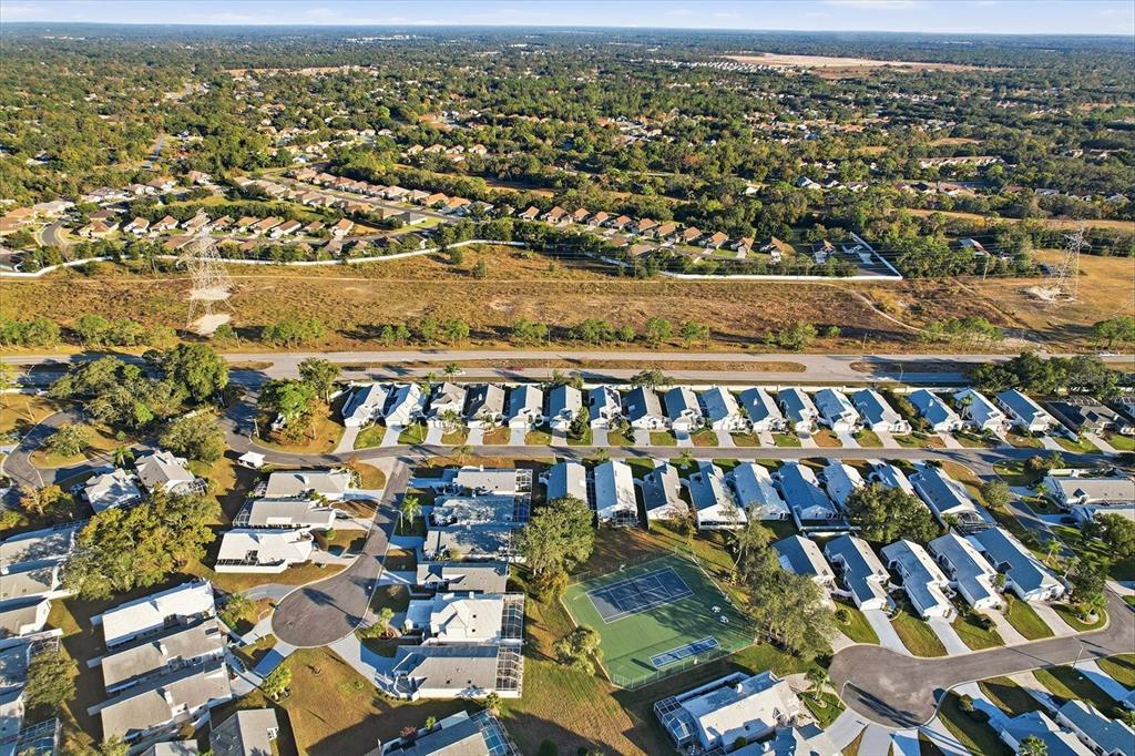 1046 Castille Drive Spring Hill, FL 34608 - Photo 42 of 44 an aerial view of multiple house
