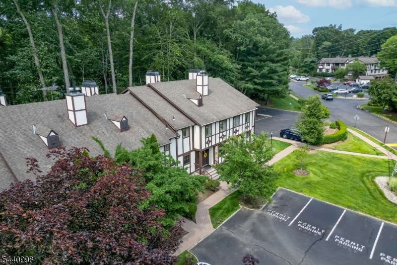 609 Mark Twain Way Mahwah, NJ 07430 - Photo 30 of 40 a house with lots of trees in the background