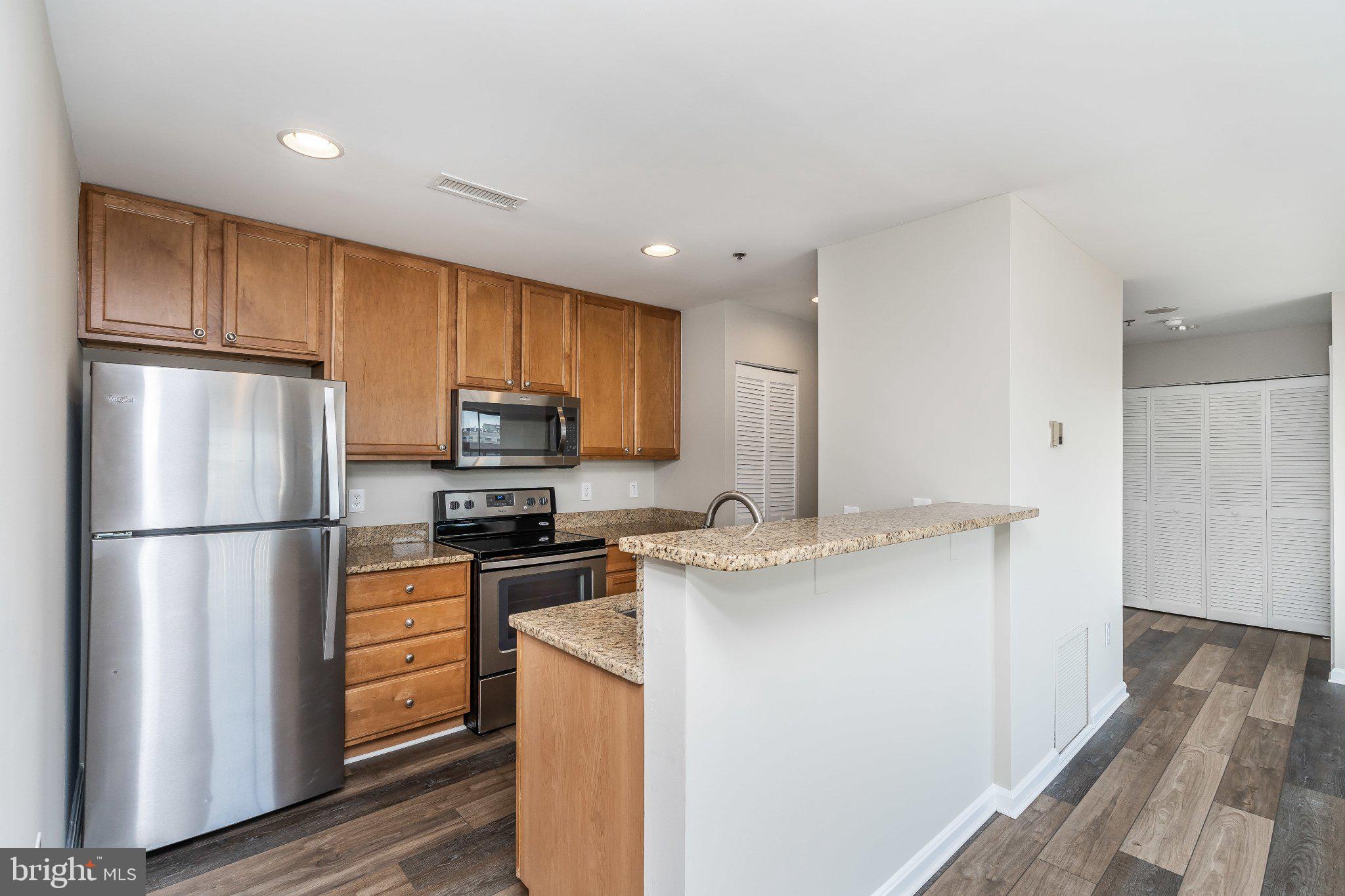 2702 Lighthouse Point East, Unit 532 Baltimore, MD 21224 - Photo 6 of 41 Modern kitchen with sleek finishes.