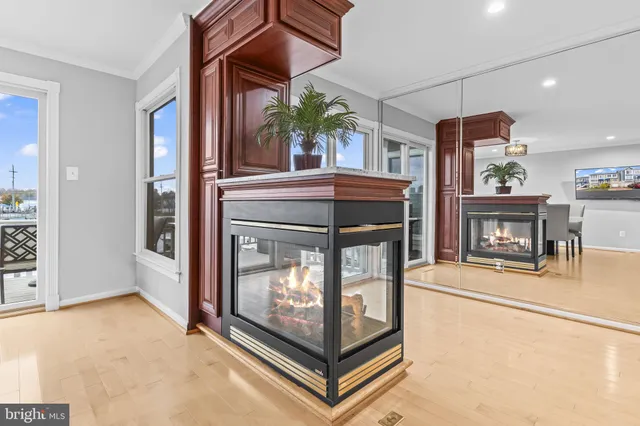 a kitchen with stainless steel appliances granite countertop wooden cabinets a stove top oven a sink and dishwasher