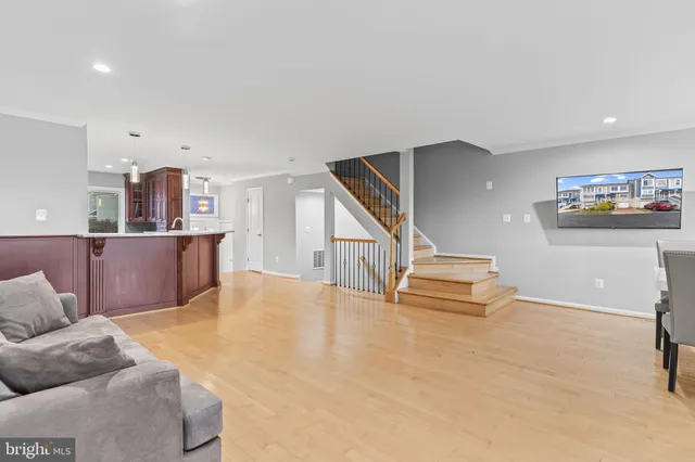 a bathroom with double sink and two mirror