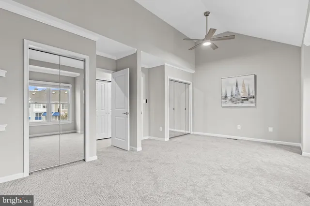 a balcony with furniture and a potted plant