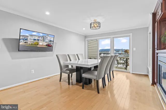 a view of a lake with couches chairs