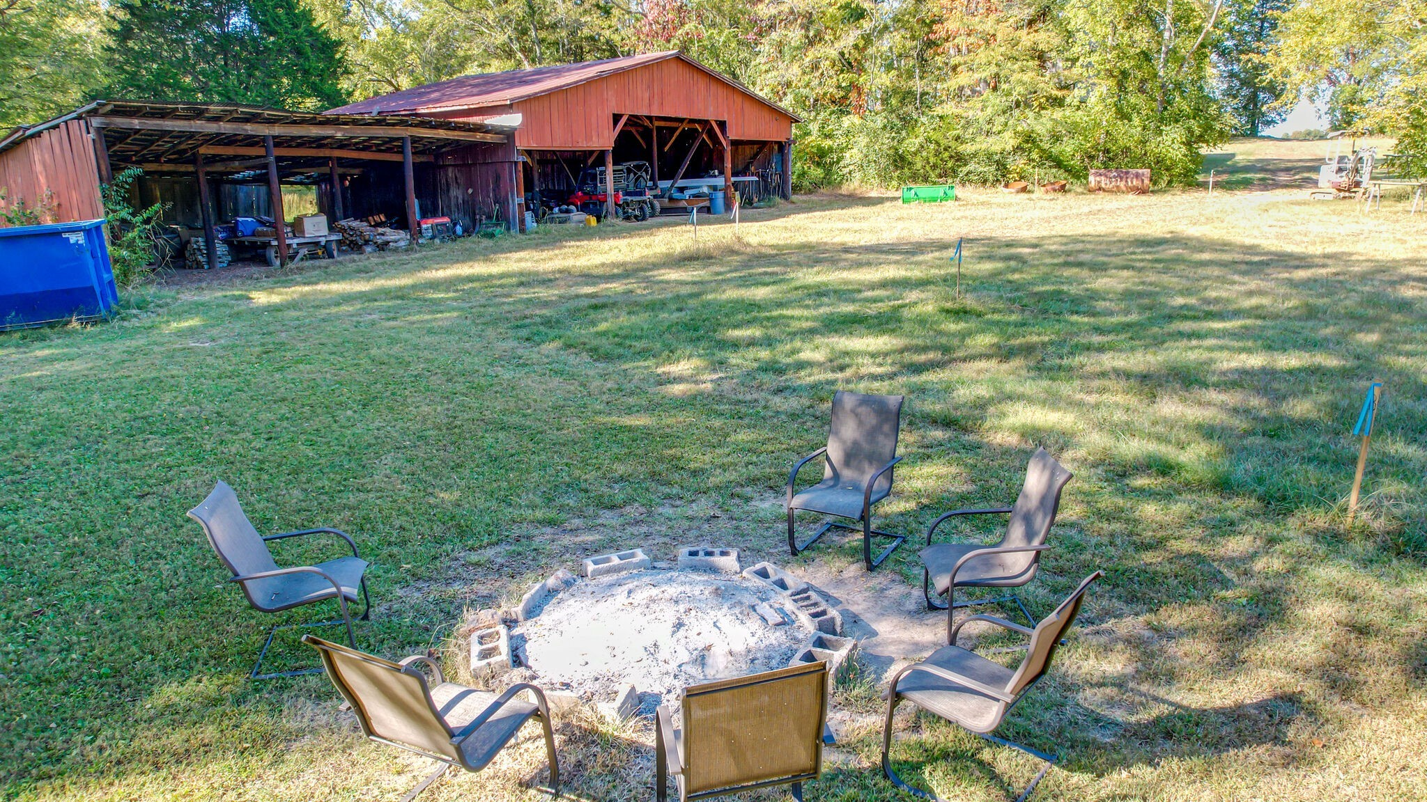 4365 North Chapel Road Franklin, TN 37067 - Photo 5 of 8 a view of a house with a yard patio and fire pit