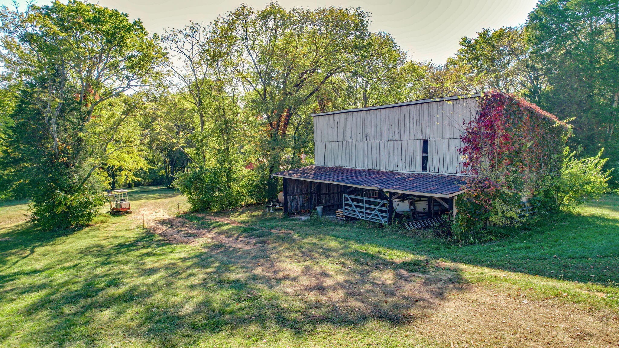4365 North Chapel Road Franklin, TN 37067 - Photo 6 of 8 a wooden fence with a bench in a yard