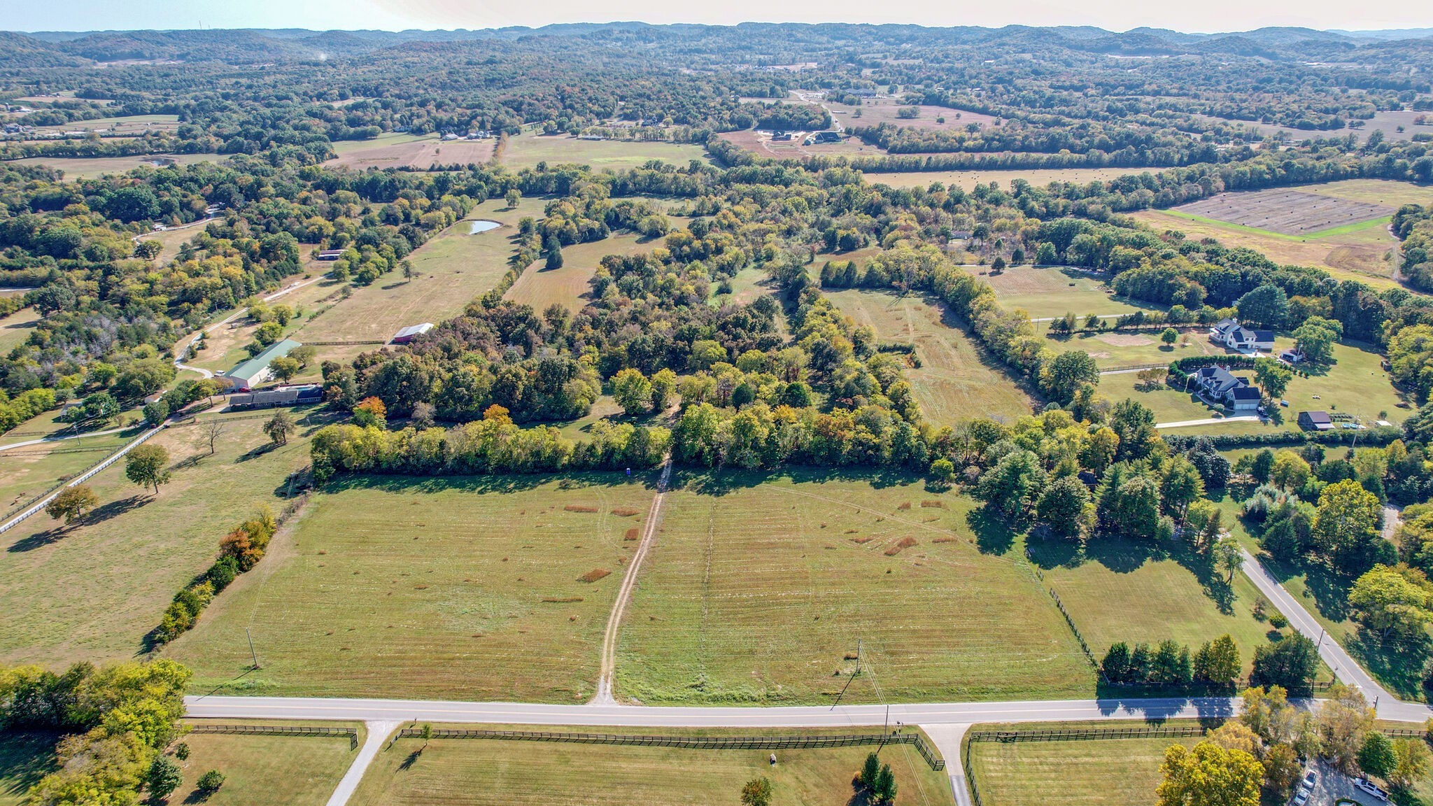 4365 North Chapel Road Franklin, TN 37067 - Photo 7 of 8 an aerial view of residential houses with outdoor space