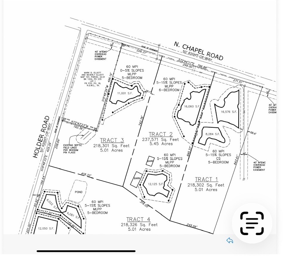 4365 North Chapel Road Franklin, TN 37067 - Photo 8 of 8 view of a bed with a white comforter and pillows