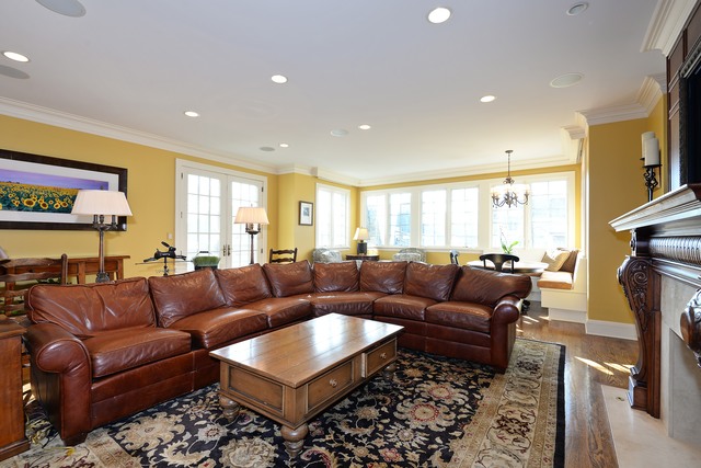 268 Ridge Avenue Winnetka, IL 60093 - Photo 11 of 26 a living room with furniture a couch and a fireplace