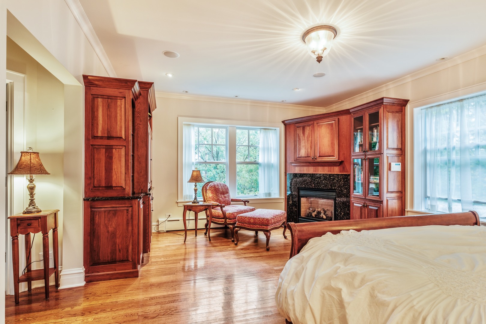 268 Ridge Avenue Winnetka, IL 60093 - Photo 14 of 26 a bed room with a bed and glass windows