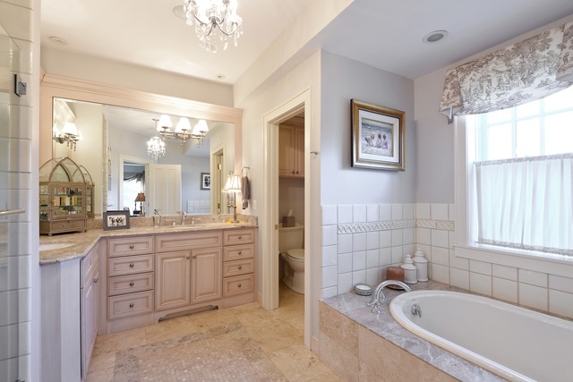 268 Ridge Avenue Winnetka, IL 60093 - Photo 15 of 26 a bathroom with a granite countertop sink a large mirror and a bathtub