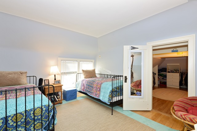 268 Ridge Avenue Winnetka, IL 60093 - Photo 16 of 26 a bedroom with furniture and a window