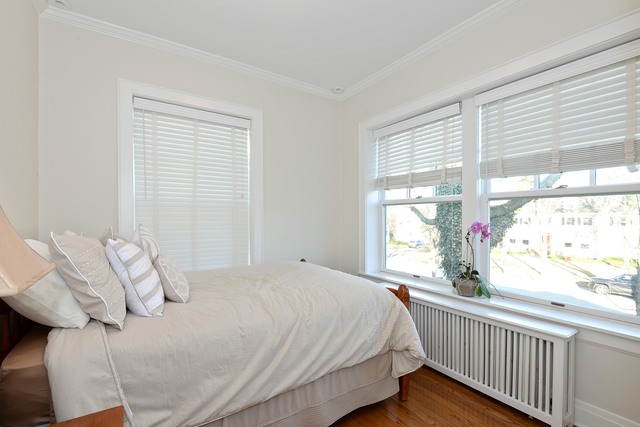 268 Ridge Avenue Winnetka, IL 60093 - Photo 18 of 26 a bedroom with a bed and a window