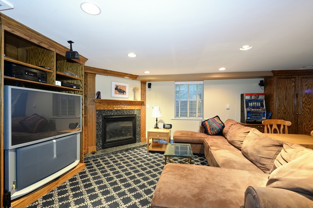 268 Ridge Avenue Winnetka, IL 60093 - Photo 20 of 26 a bedroom with furniture and a fireplace