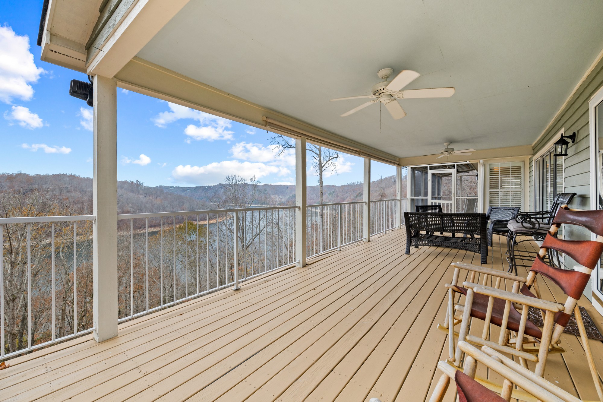 998 Highland Trail Sparta, TN 38583 - Photo 28 of 43 a bedroom with furniture large window and wooden floor