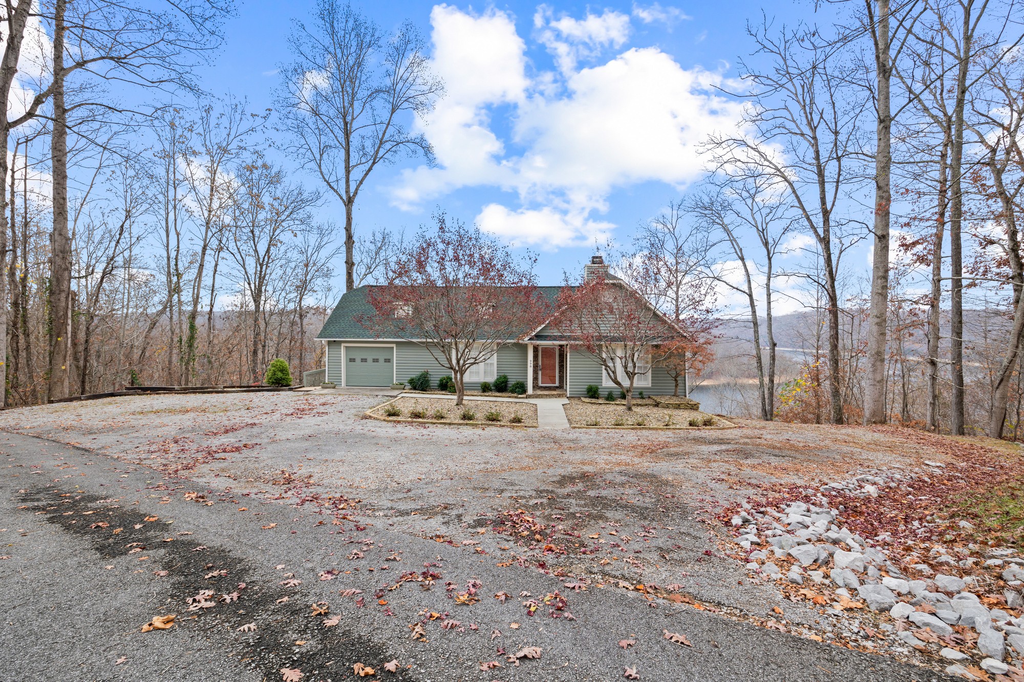 998 Highland Trail Sparta, TN 38583 - Photo 29 of 43 a view of a house with a yard covered in snow