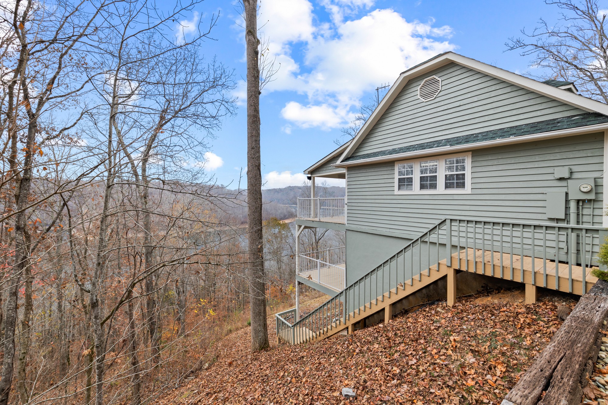 998 Highland Trail Sparta, TN 38583 - Photo 31 of 43 a view of house with a roof deck