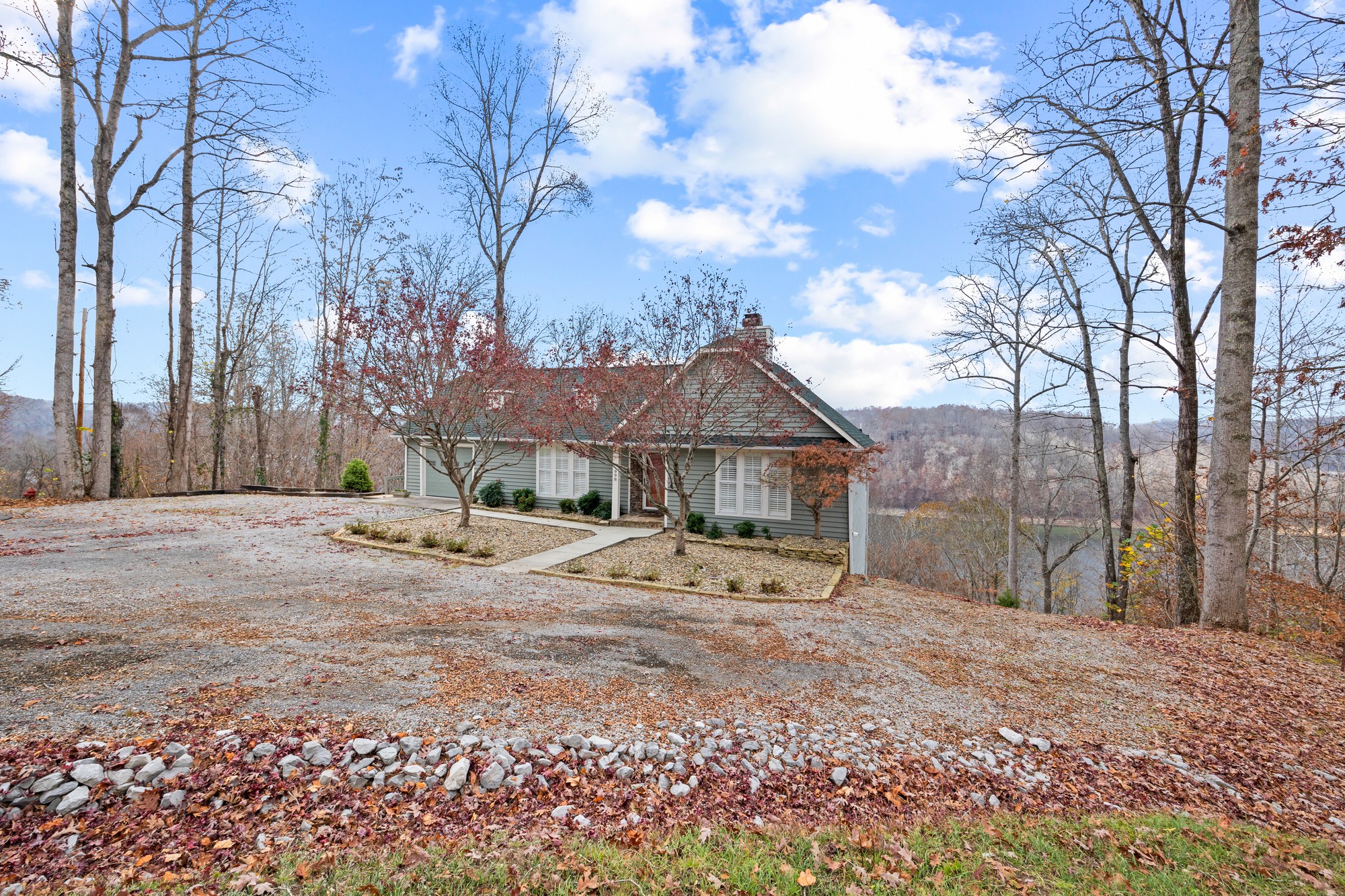 998 Highland Trail Sparta, TN 38583 - Photo 33 of 43 a view of a house with a snow in the yard