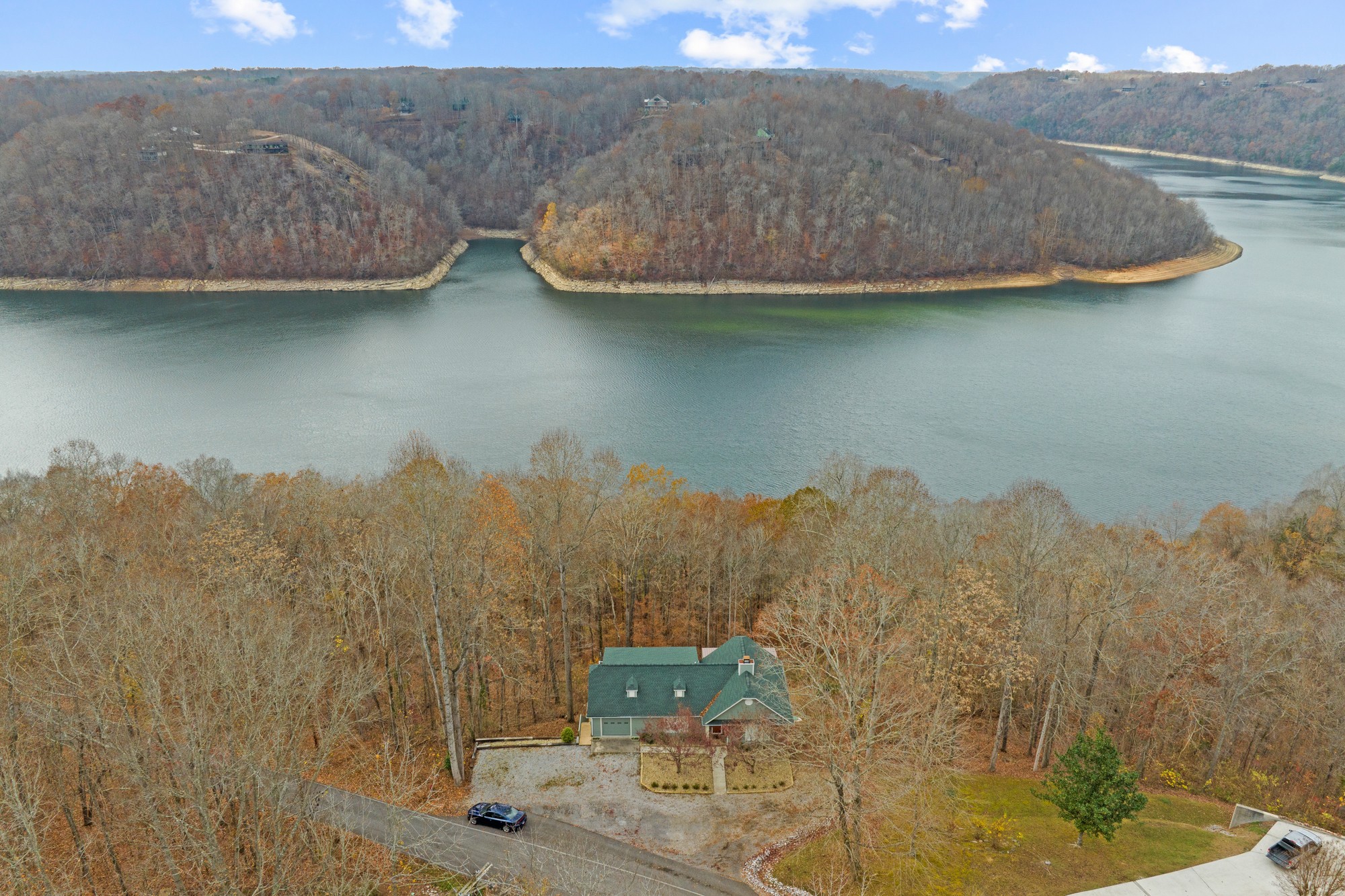 998 Highland Trail Sparta, TN 38583 - Photo 43 of 43 a view of a house with a yard and a lake view