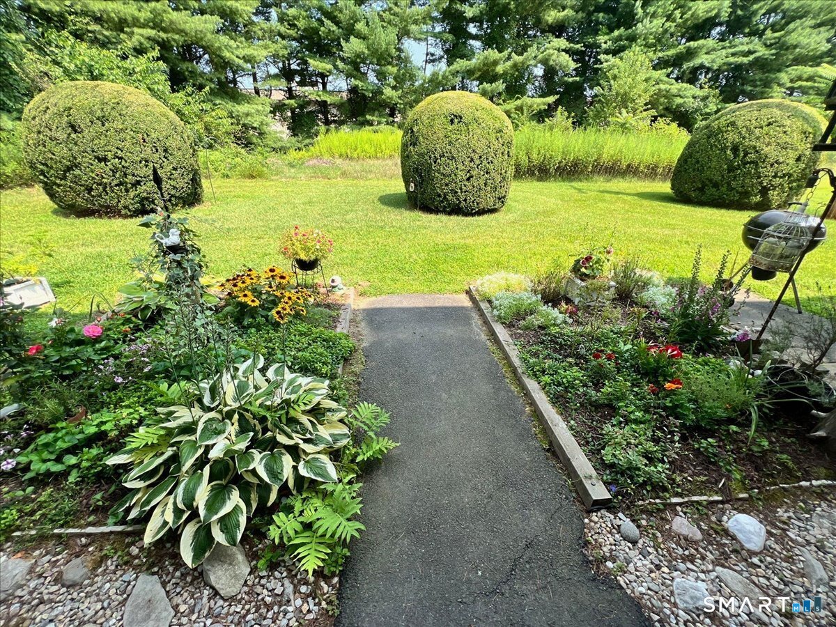 38 Candlewood Lake Road South, Unit 3 New Milford, CT 06776 - Photo 35 of 35 Backyard Picture taken in the summer