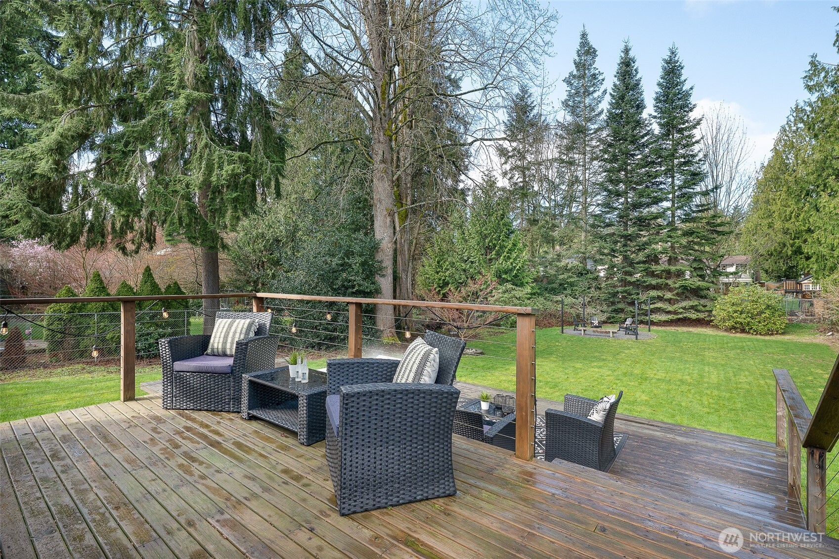 18824 80th Avenue West Edmonds, WA 98026 - Photo 12 of 35 a view of a deck with chairs and a yard
