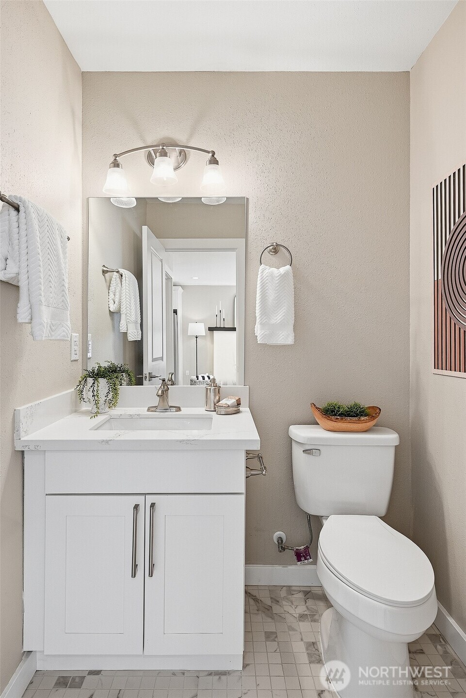 18824 80th Avenue West Edmonds, WA 98026 - Photo 14 of 35 a bathroom with a toilet a sink and mirror