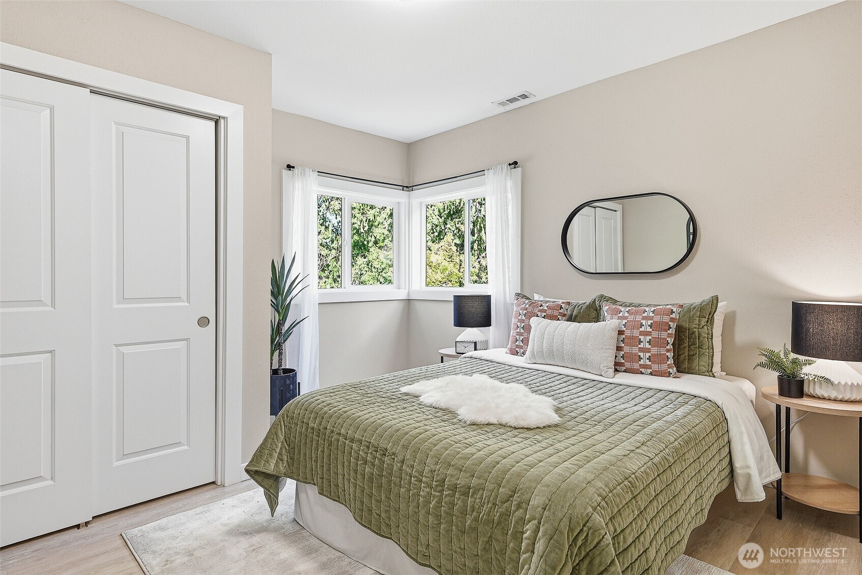 18824 80th Avenue West Edmonds, WA 98026 - Photo 15 of 35 a bedroom with a bed and a window