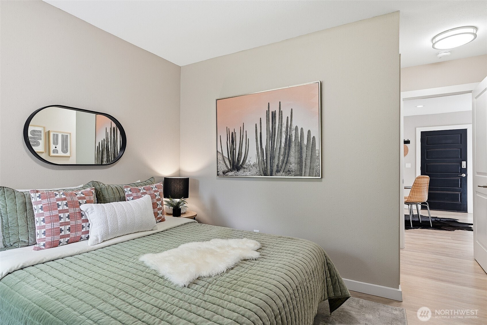 18824 80th Avenue West Edmonds, WA 98026 - Photo 17 of 35 a bedroom with a bed and a mirror