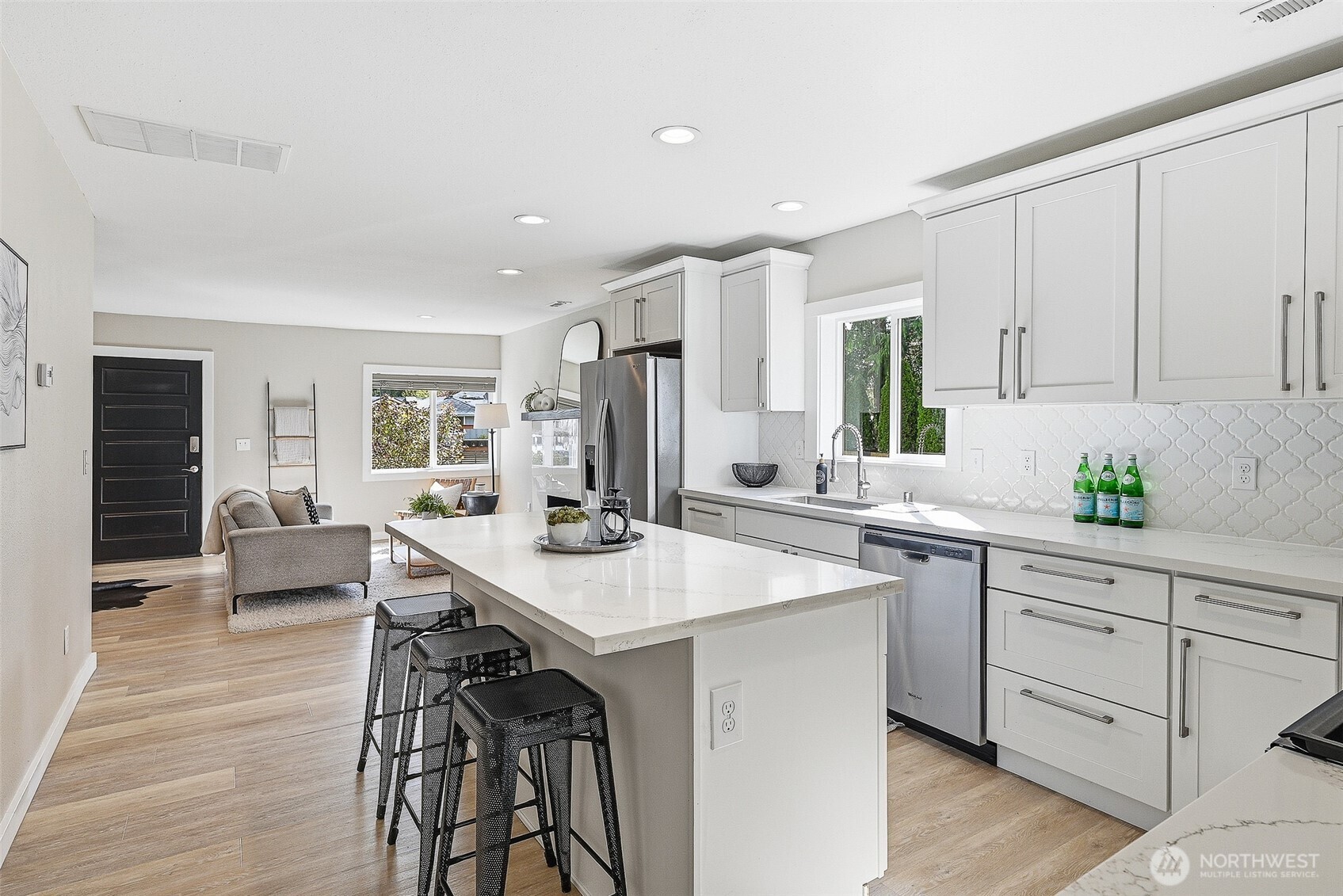 18824 80th Avenue West Edmonds, WA 98026 - Photo 9 of 35 a kitchen with white cabinets stove and sink