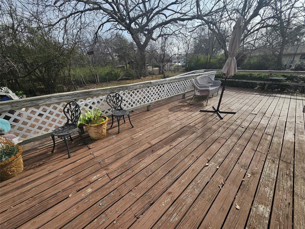 3200 Donna Road Denton, TX 76207 - Photo 39 of 40 a view of deck with wooden floor and outdoor seating